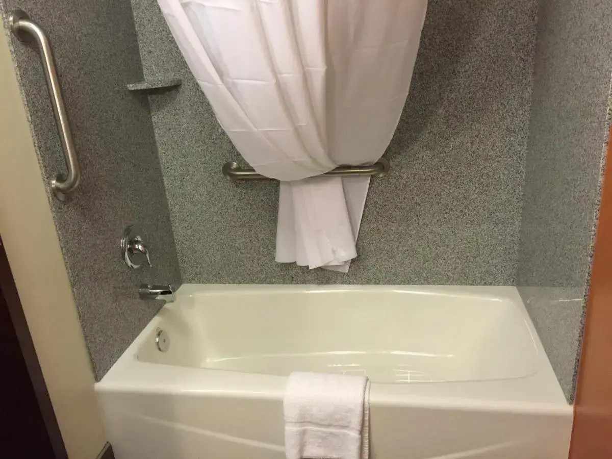 A hotel jacuzzi room at a property with an indoor pool